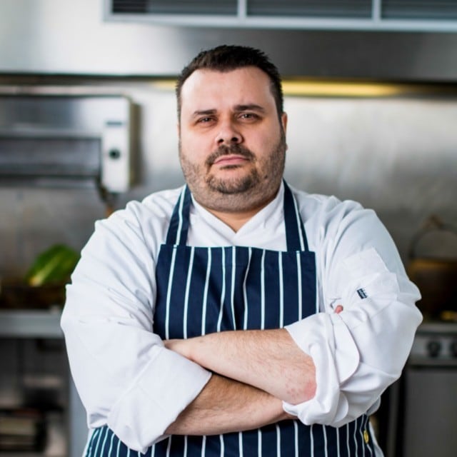 The man behind the apron