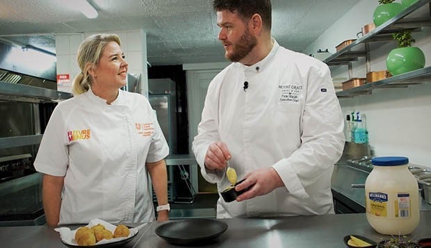 Chef Pieter Malan working alongside a fellow chef in the Mount Grace Hotel and Spa kitchen.