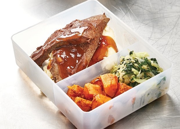 Liver and veg in a plastic container. 