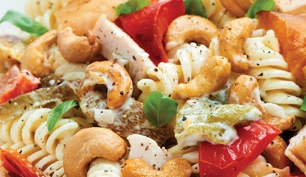 Pasta salad with peppers and cashews. 