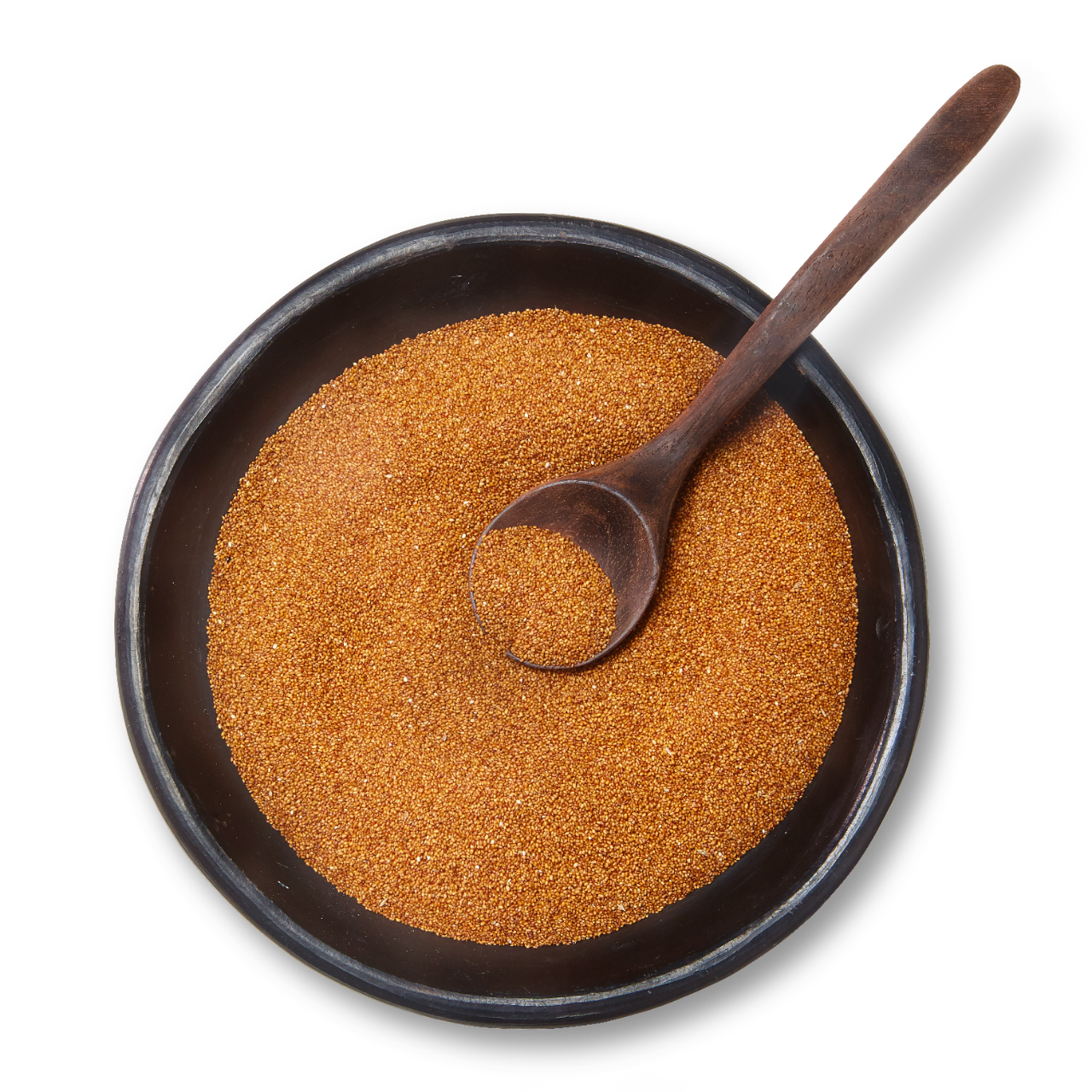 Grain in a bowl with spoon.
