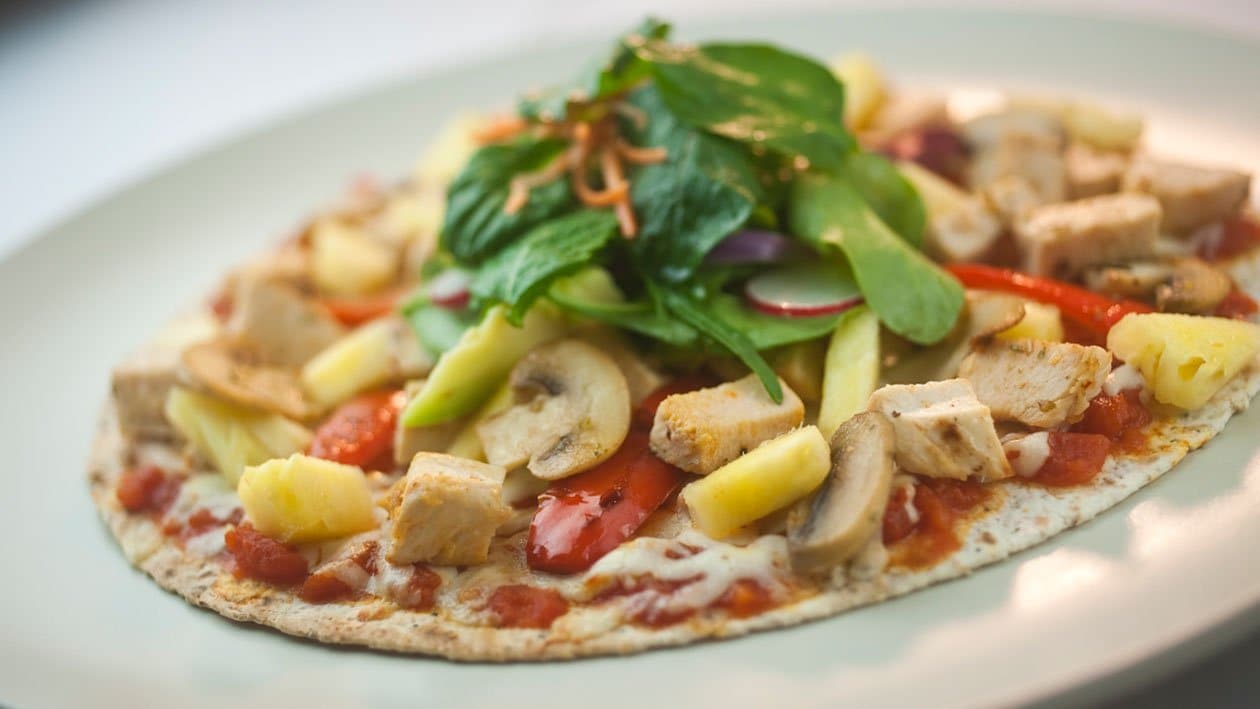 Whole grain pizza topped with grillled chicken, fresh pineapple – - Recipe