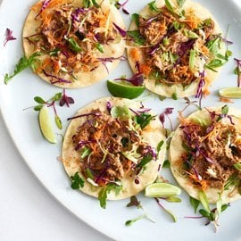 Tacos with Roast Pork, Guacamole, Sour Cream and Pickled Fish