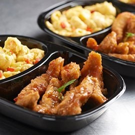 Chicken Strips Dunked in Sweet Chilli Sauce