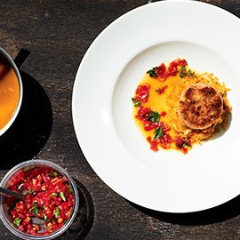 Fishcakes on a bed of Mildly Spiced Slaw with Pan Juices