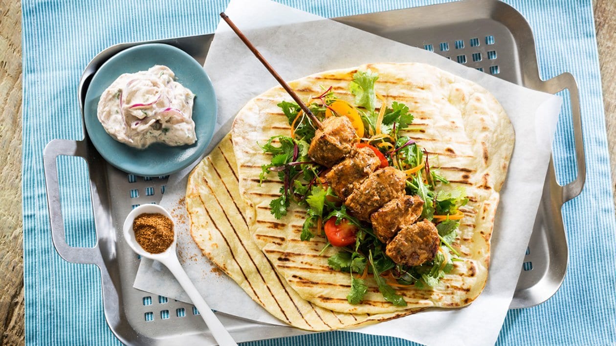 Spicy Bbq Chicken Skewers with Red Onion Tzatziki and Potato Flat Bread – - Recipe