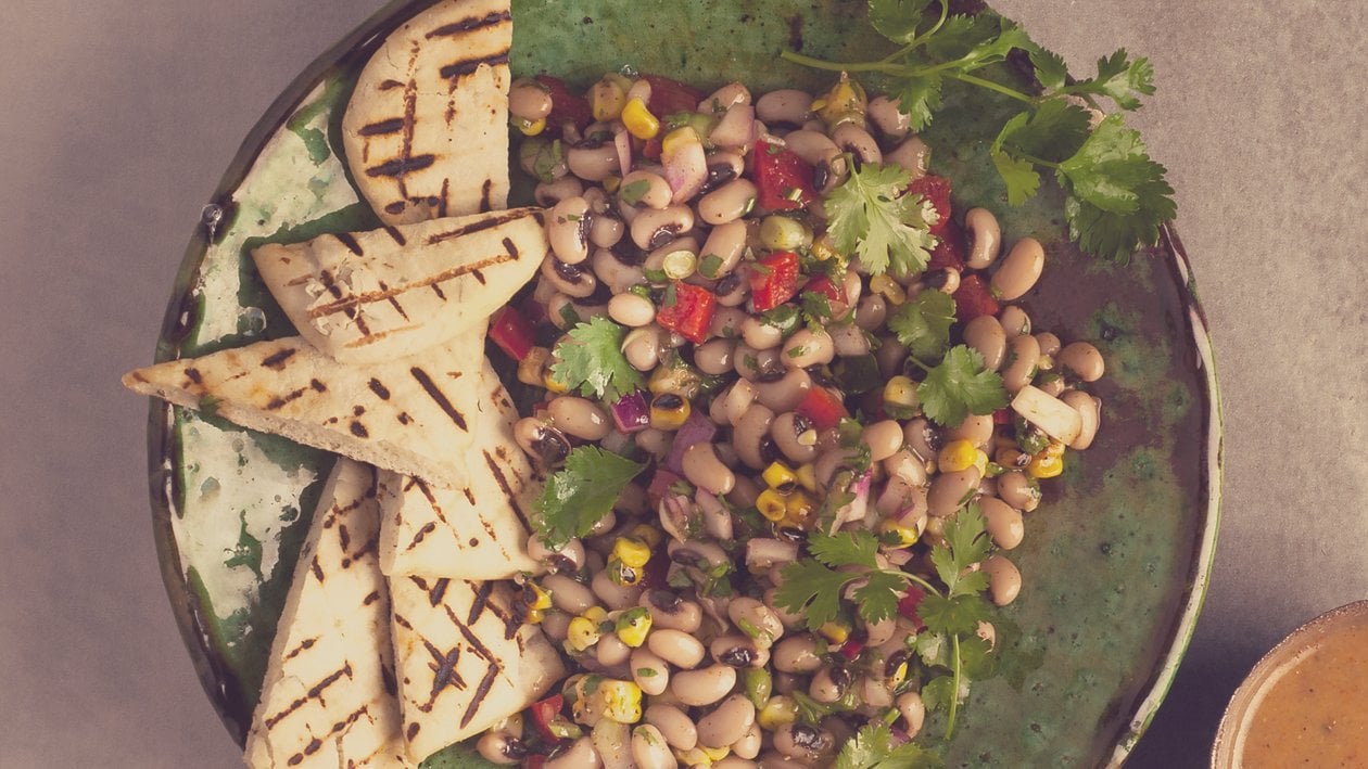 Black-Eyed Bean Salad with Toasted Pita and East African Dressing – - Recipe