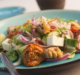 Greek salad with deep fried olives