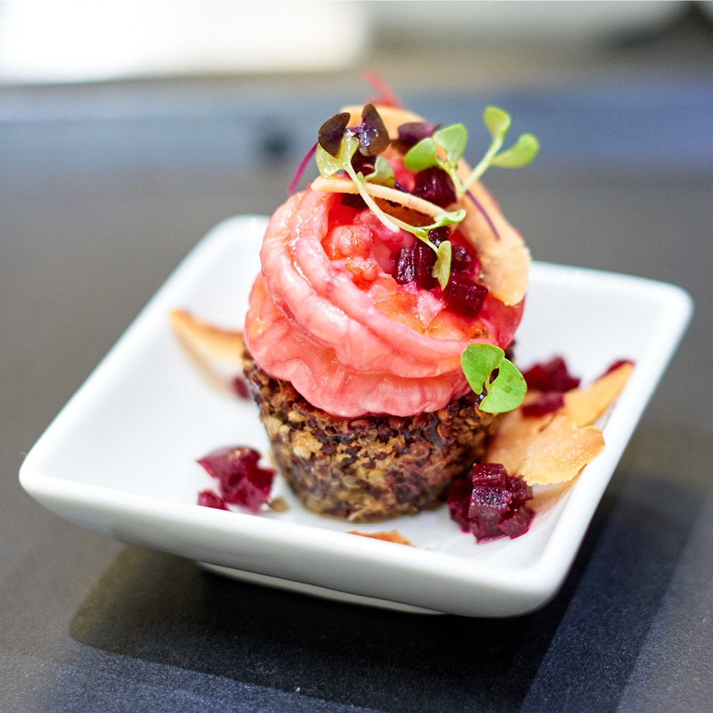 Red Quinoa Crusted Pumpkin Tartlet With Beetroot Ginger Poached Prawns And A Chilli Garlic Coconut Sauce