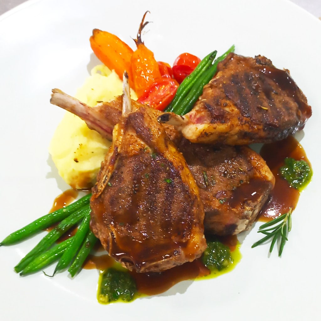 Grilled Lamb Chops with Herbed Mash, Baby Roast Veg and Mint Jus